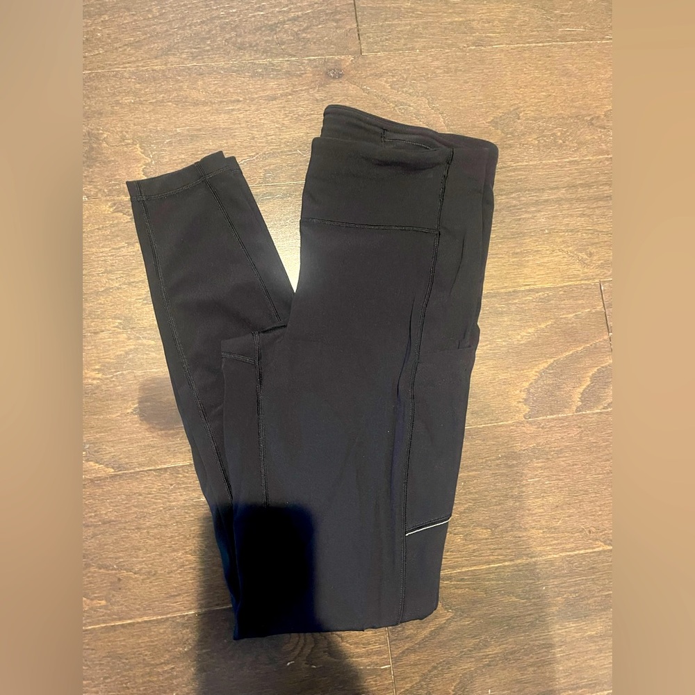 Lululemon leggings , size 8. Black , never worn